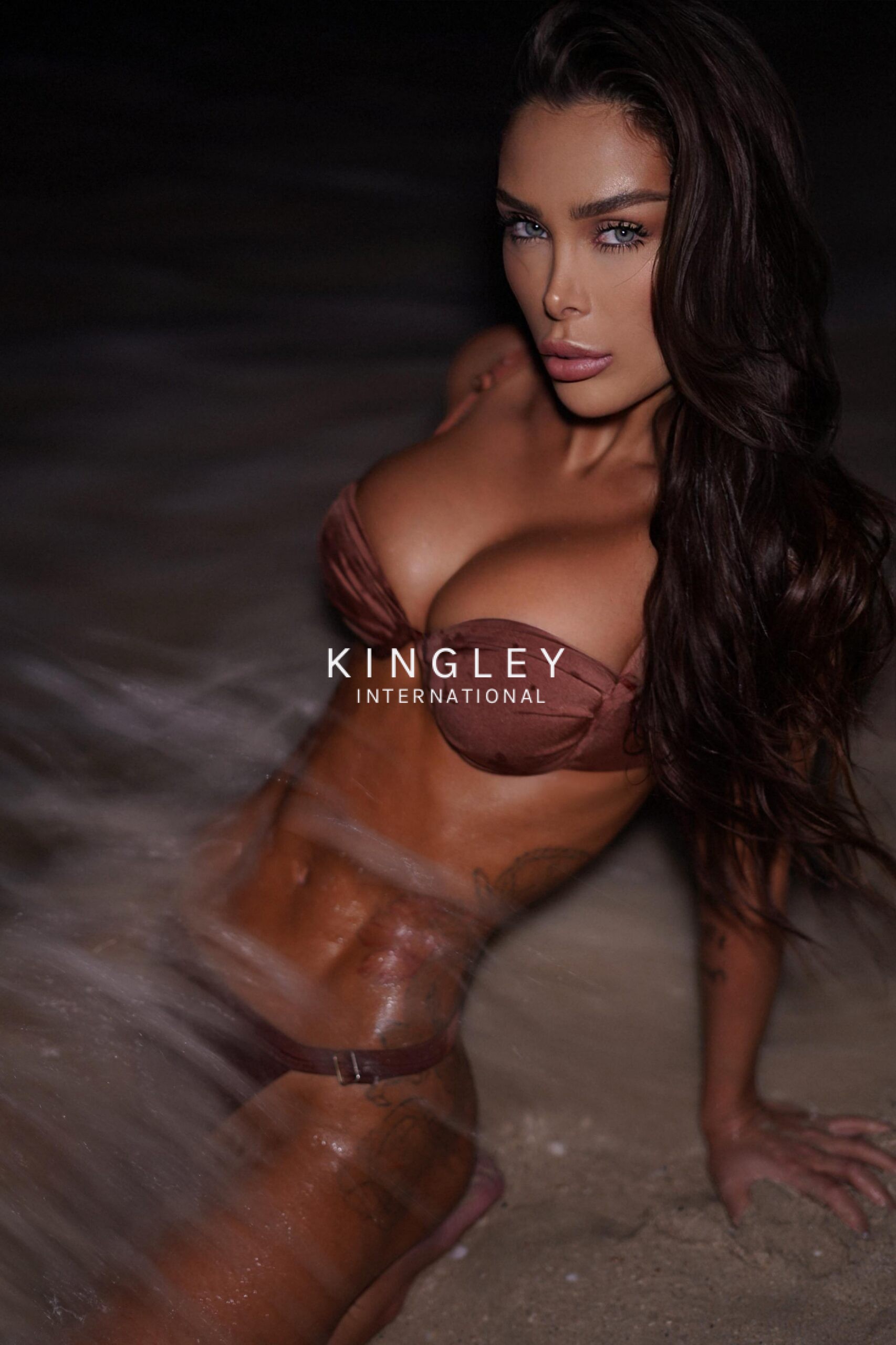 Elite escort in the sea with bikini